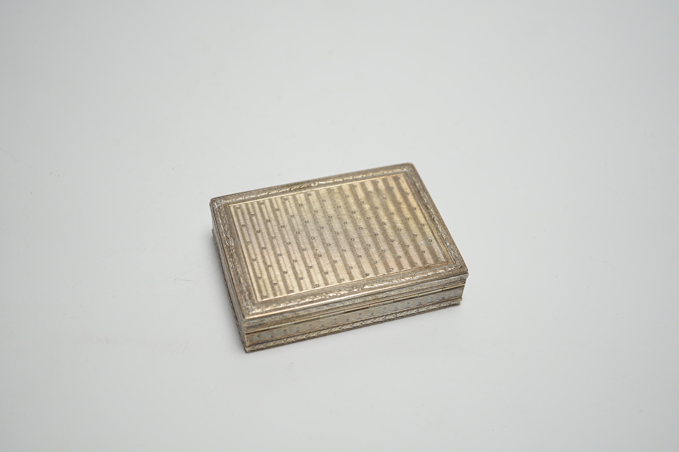 A late 19th century continental engine turned silver rectangular snuff box, import marks for Edwin Thompson Bryant, London, 1897, 78mm.